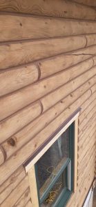 Finished logs on house